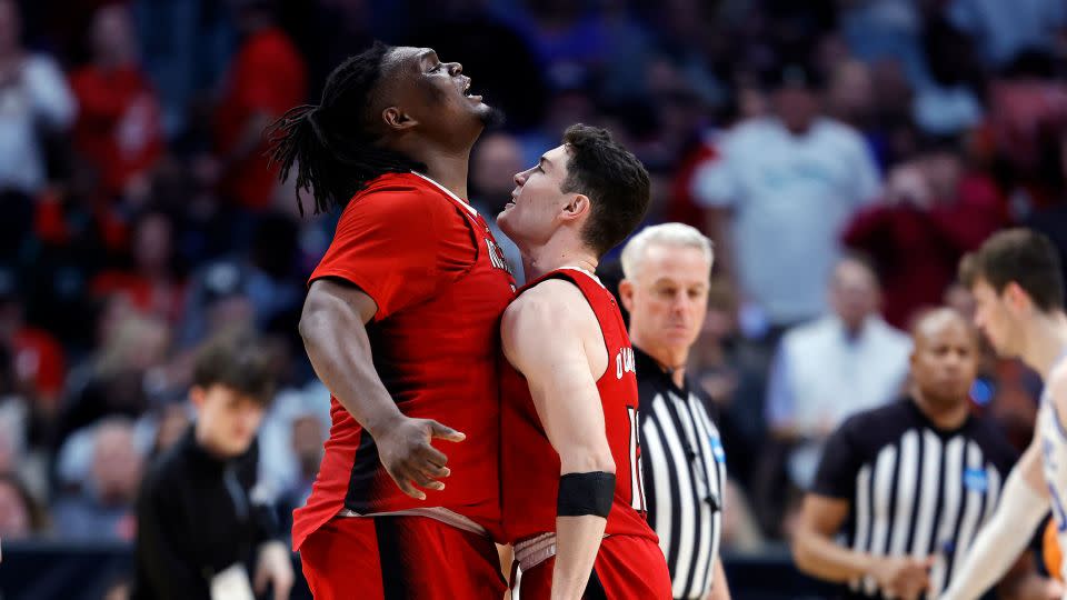 Burns (left) has been the breakout star of this year's men's March Madness. - Carmen Mandato/Getty Images