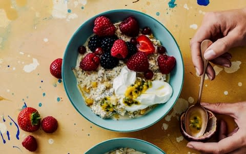 Sunny Bircher muesli with yogurt, berries and passion fruit - Credit: Haarala Hamilton