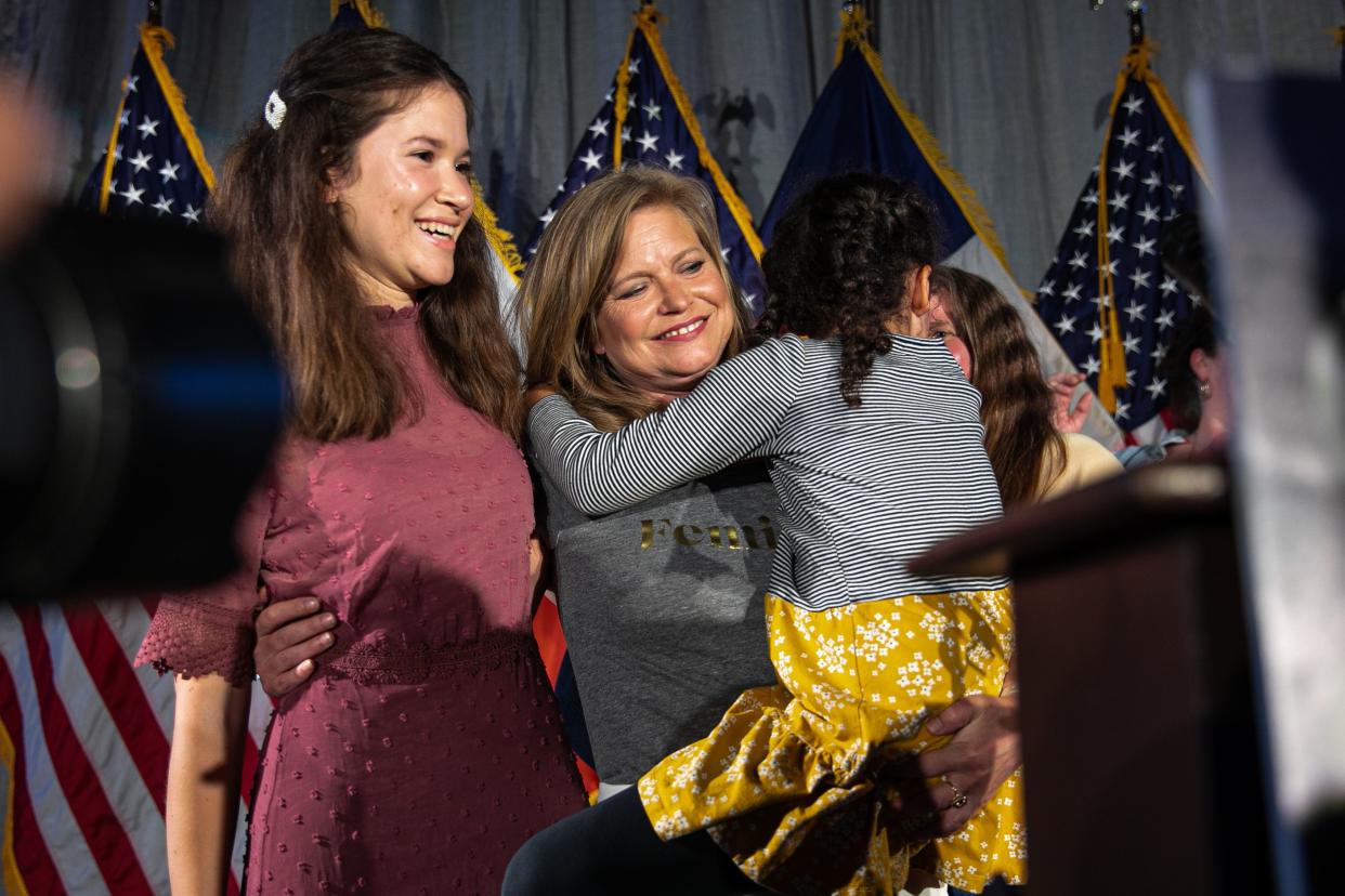 Mayoral candidate Kathryn Garcia, center, hugs her family after speaking to her supporters on election night at 99 Scott Ave in Brooklyn, New York on Tuesday, June 22, 2021.