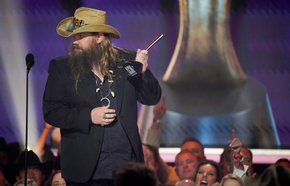 Chris Stapleton accepts the award for Entertainer of the Year during the 58th ACM Awards at the Ford Center at the Star in Frisco Texas, on Thursday, May 11, 2023.