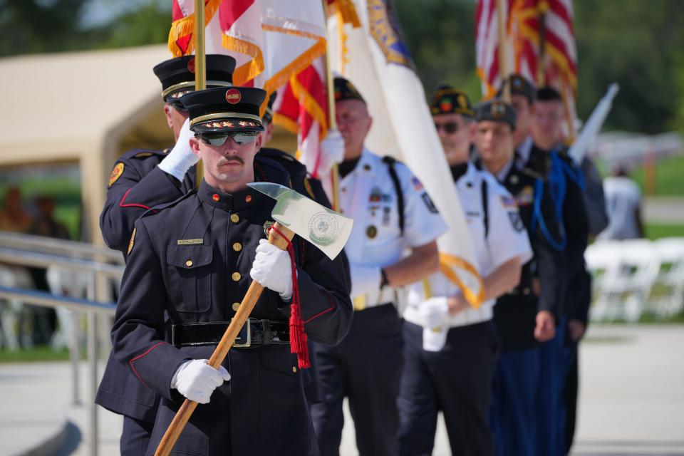 The Palm Beach County Fire Rescue Honor Guard leads a procession the 18th Annual Memorial Day Ceremony at the South Florida National Cemetery on Monday, May 27, 2024, near Lake Worth Beach.