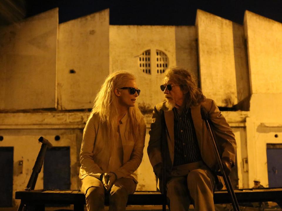 This image released by Sony Pictures Classics shows Tilda Swinton, left, and John Hurt in a scene from "Only Lovers Left Alive." (AP Photo/Sony Pictures Classics, Sandro Kopp)