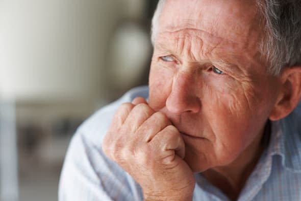 BMGP68 Closeup of a lonely senior man lost in thought , looking away. Image shot 2009. Exact date unknown.