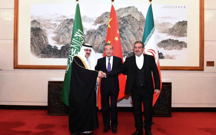 From L-R: Ali Shamkhani, secretary of Iran's Supreme National Security Council; Wang Yi, China's most senior diplomat; and Musaad bin Mohammed al-Aiban, Saudi national security adviser, at a closed meeting in Beijing on March 11 - Luo Xiaoguang/Xinhua