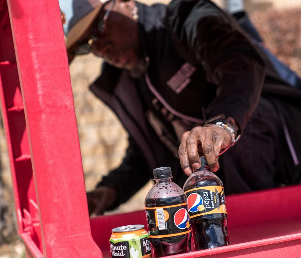 Kevin Tave unloads donated food outside the Salvation Army&#39;s food bank in Aurora, Colorado.