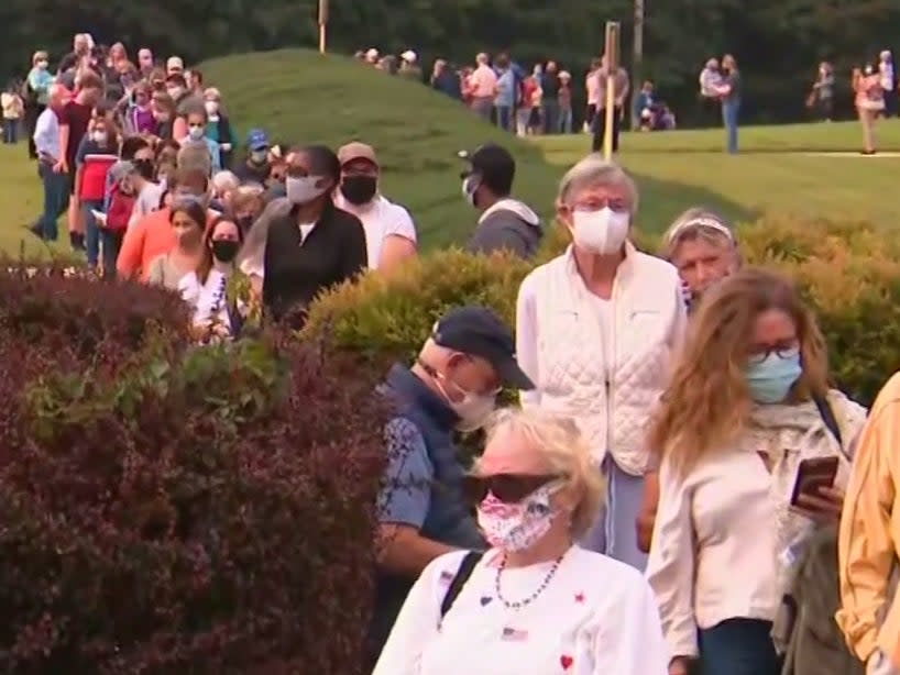 Voters wait in line in Fairfax, Virginia, on the first day of early in-person voting in the state ((CNN))