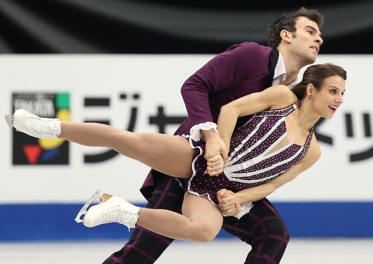 Canada's pair Meagan Duhamel and Eric Radford perform during in the pairs' Free Skating competition at the world figure skating championships in Saitama, Japan, on March 27, 2014