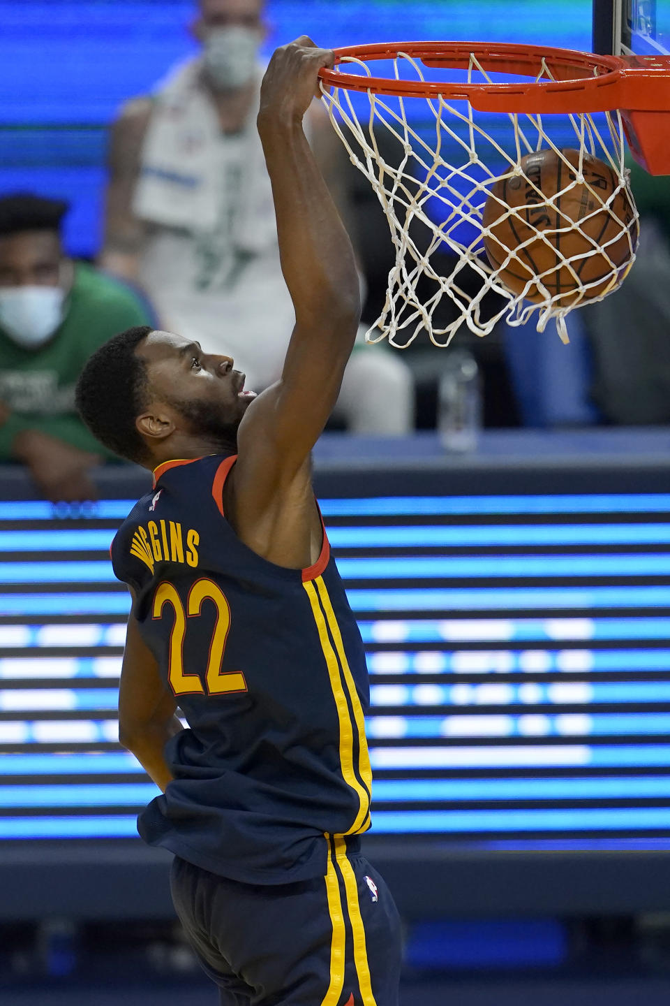 Golden State Warriors forward Andrew Wiggins dunks against the Boston Celtics during the first half of an NBA basketball game in San Francisco, Tuesday, Feb. 2, 2021. (AP Photo/Jeff Chiu)