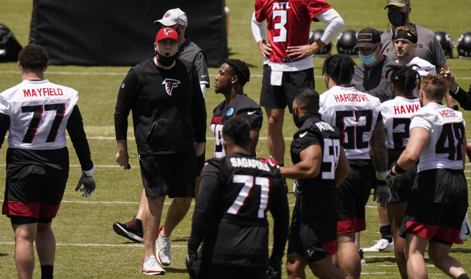 Atlanta Falcons head coach Arthur Smith yells to the team during an NFL football rookie minicamp on Friday, May 14, 2021, in Flowery Branch, Ga. (AP Photo/Brynn Anderson)