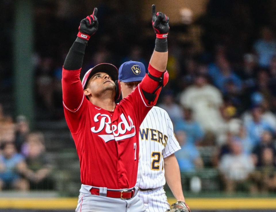 Aug 7, 2022; Milwaukee, Wisconsin, USA; Cincinnati Reds second baseman Donovan Solano (7) reacts after hitting a RBI double in the eighth inning against the Milwaukee Brewers at American Family Field. Mandatory Credit: Benny Sieu-USA TODAY Sports