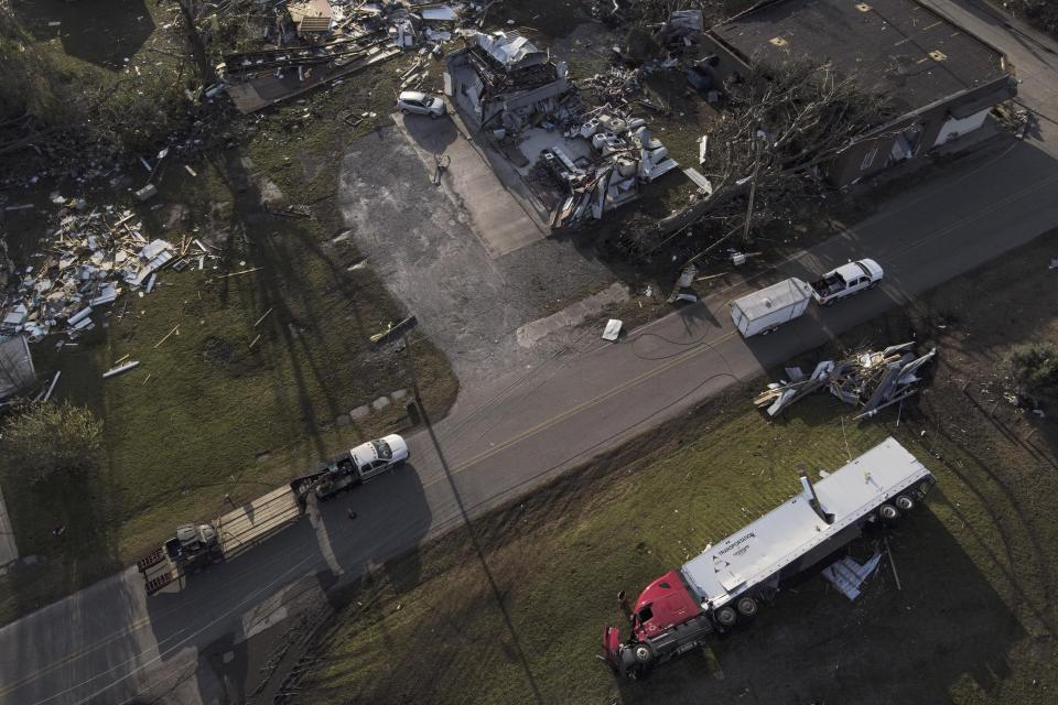 Damage is visible Sunday, March 26, 2023, in Rolling Fork, Miss., after a tornado ripped through the community. Emergency officials in Mississippi say several people have been killed by tornadoes that tore through the state on Friday night, destroying buildings and knocking out power as severe weather produced hail the size of golf balls moved through several southern states. (AP Photo/Julio Cortez)