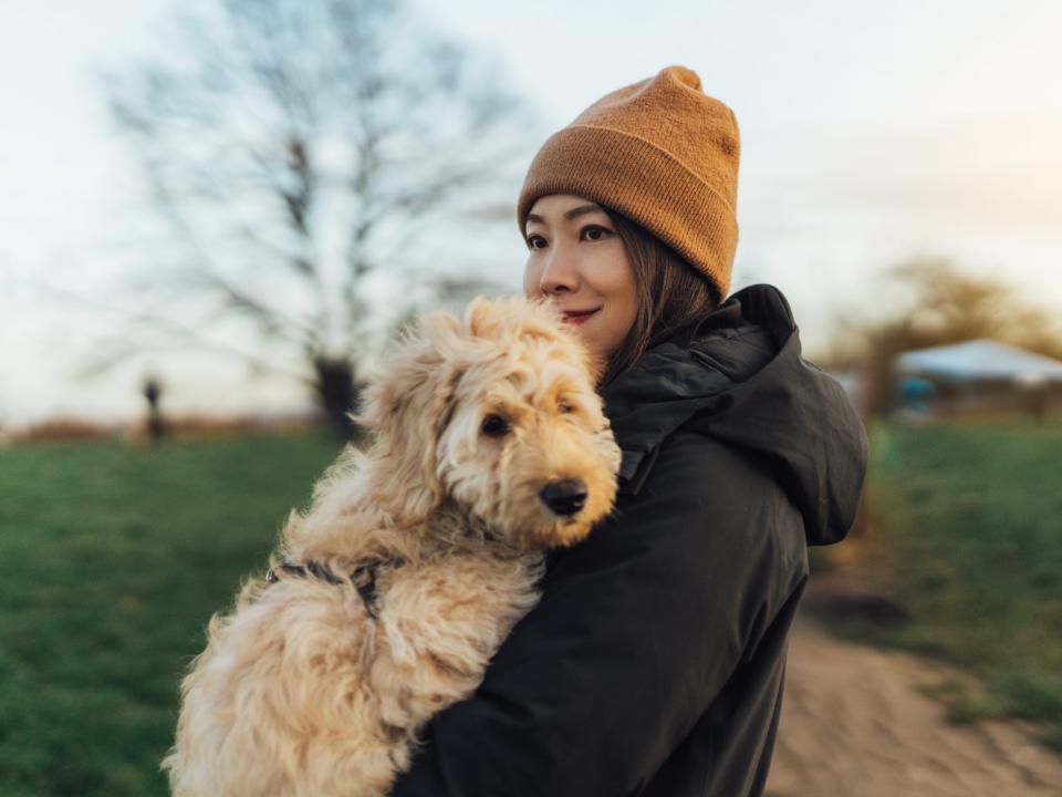 woman dog park outdoors