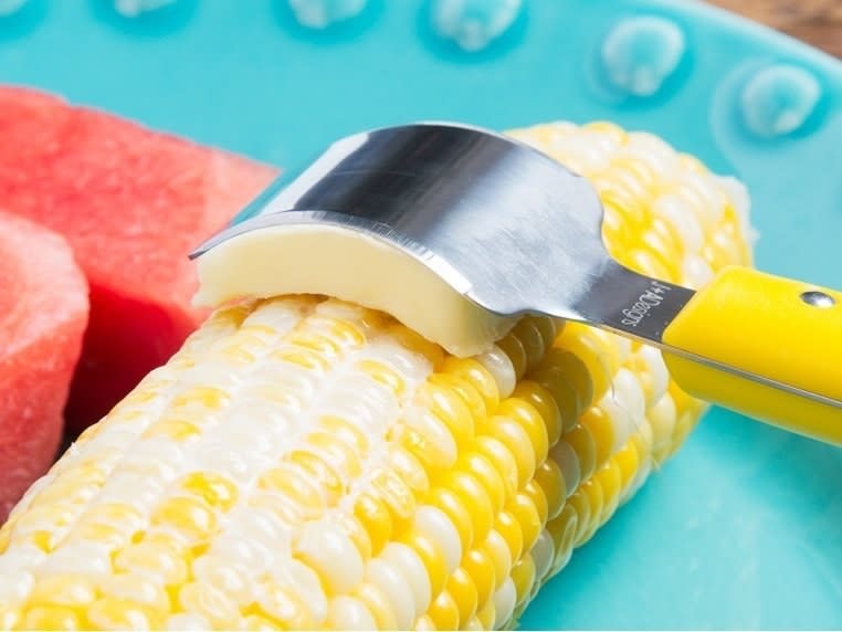 Ensure each kernel is coated in golden goodness without much of a hassle or mess.<br /><br /><strong>Promising review:</strong> "I purchased the corn butter knife early in the summer &mdash; just in time for corn season. Since it comes in a set of two, I gave one to my daughter and son-in-law; their comment was, 'Why hasn't anyone ever thought of this before?!' <strong>It's a MUCH better solution than rolling the cob in a slab of butter!</strong>" &mdash; Anne<br /><br /><strong>Get a two-pack from The Grommet for <a href="https://go.skimresources.com?id=38395X987171&amp;xs=1&amp;url=https%3A%2F%2Fwww.thegrommet.com%2Fproducts%2Fbutteronce-corn-butter-knife-two-pack&amp;xcust=HPHandheldKitchenTools607ef55ae4b01bc7979c2797" target="_blank" rel="noopener noreferrer">$13.95 </a>or Amazon for <a href="https://amzn.to/3tJRVC5" target="_blank" rel="noopener noreferrer">$9.99</a>. </strong>