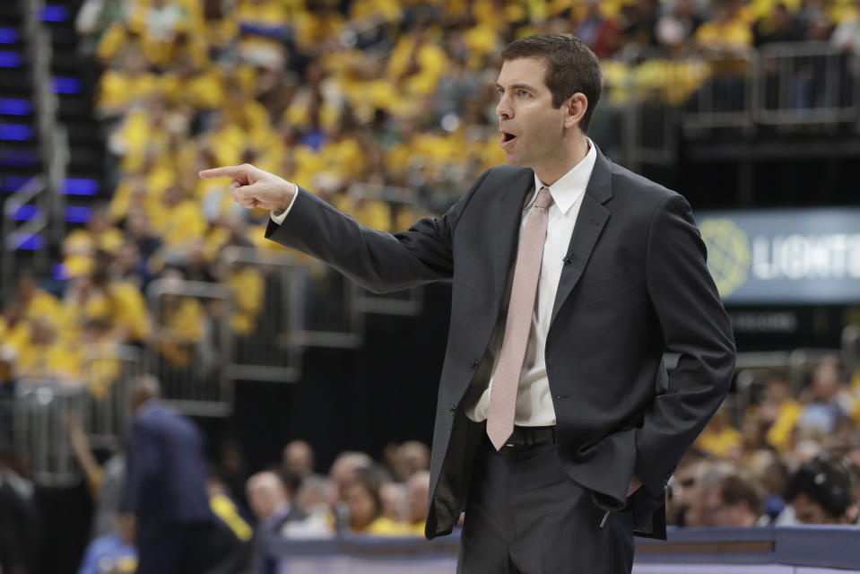 Boston Celtics coach Brad Stevens gestures during the first half of Game 3 of the team's NBA basketball first-round playoff series against the Indiana Pacers, Friday, April 19, 2019, in Indianapolis. (AP Photo/Darron Cummings)