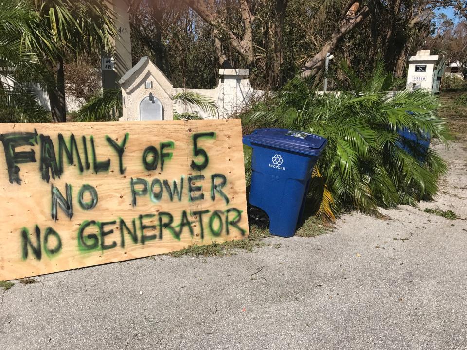 <p>A sign is posted outside a home following powerful Hurricane Irma on Sept. 12, 2017 in Key Largo in the Florida Keys. Irma made landfall in the Florida Keys as a Category 4 Sunday, swelling waterways an estimated 10 to 15 feet, according to published reports. (Photo: Marc Serota/Getty Images) </p>