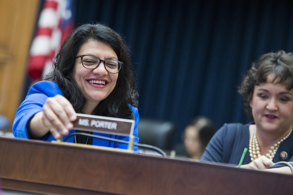 UNITED STATES - MAY 16: Rep. Rashida Tlaib, D-Mich., left, installs the name plate for Rep. Katie Porter, D-Calif., during a House Financial Services Committee hearing in Rayburn Building titled "Oversight of Prudential Regulators: Ensuring the Safety, Soundness and Accountability of Megabanks and Other Depository Institutions," on Thursday, May 16, 2019. (Photo By Tom Williams/CQ Roll Call)