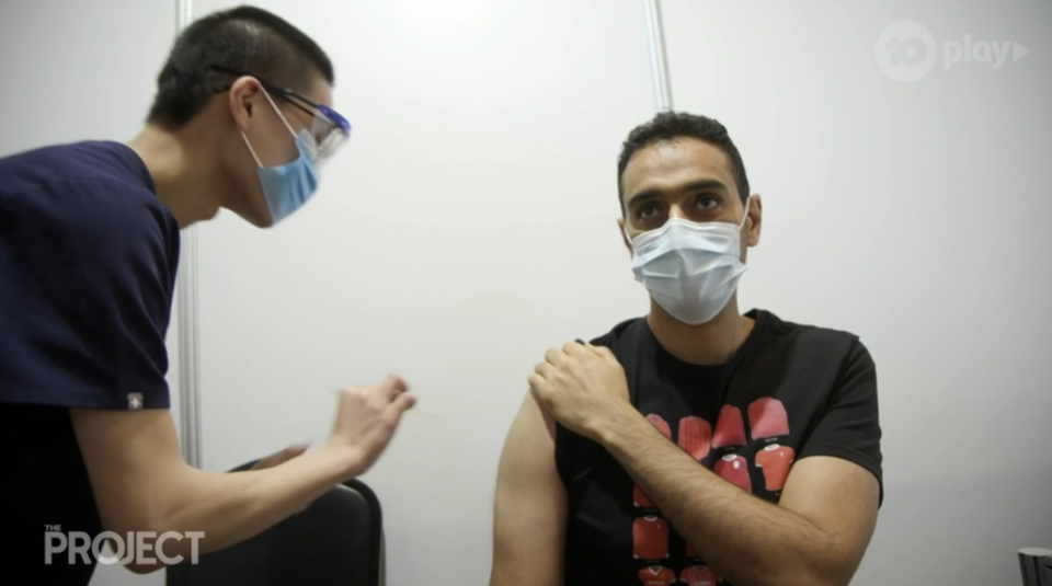 Waleed Aly receiving his Covid vaccine