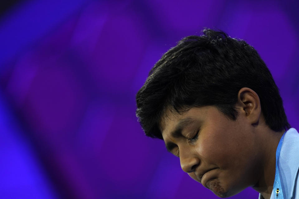 Aryan Khedkar, 12, from Rochester, Hills Mich., reacts as he misses his word and is eliminated during the Scripps National Spelling Bee finals, Thursday, June 1, 2023, in Oxon Hill, Md. (AP Photo/Nathan Howard)