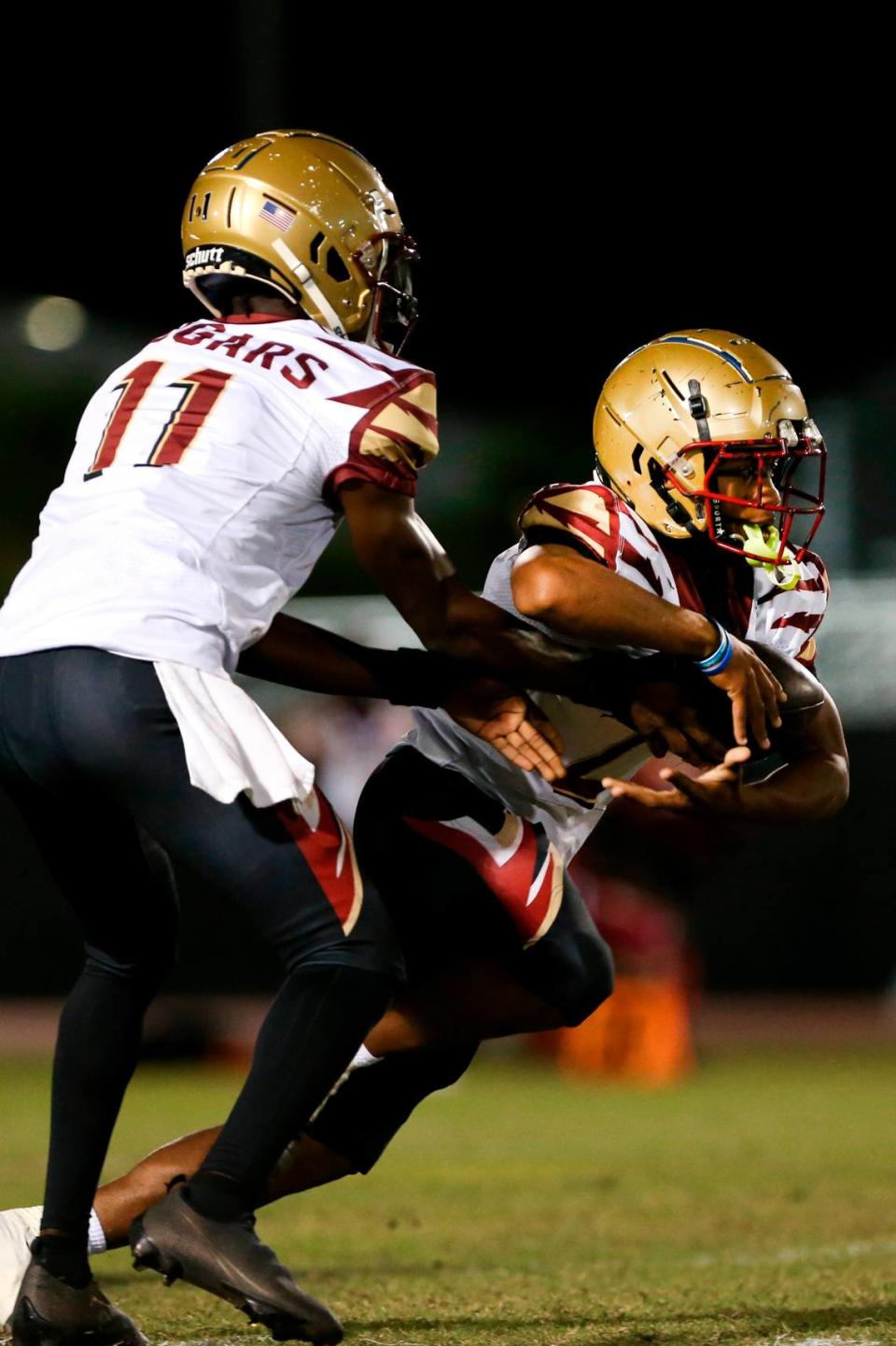Coconut Creek running back Jamarie Hostzclaw, seen here running the ball against Palmetto in 2022, ran for 114 yards on Friday to lead the Cougars to a 20-15 win over Davie Western.