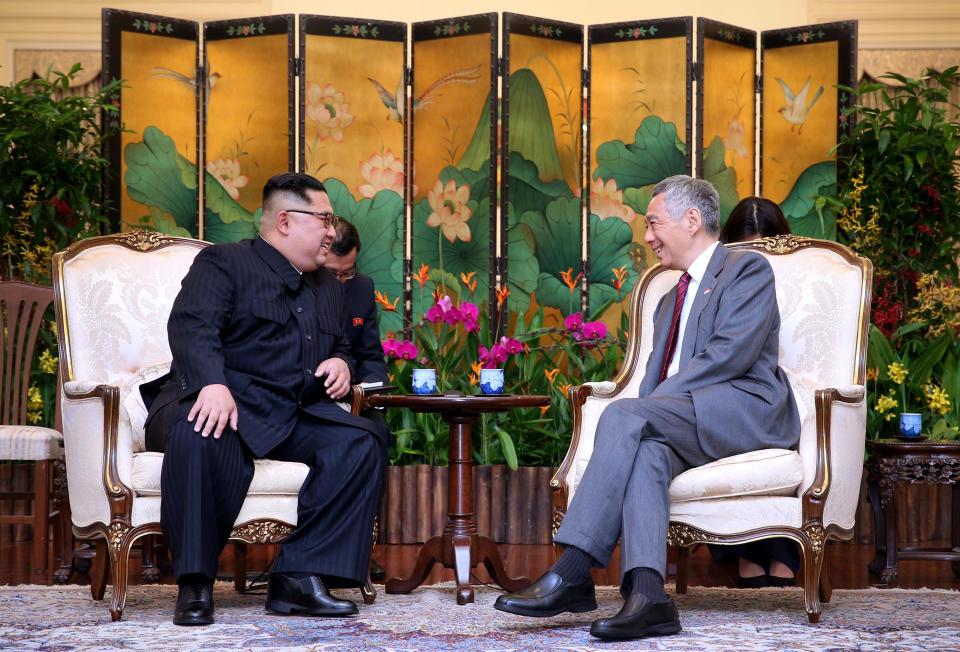 <p>North Korea’s leader Kim Jong Un shakes hands with Singapore’s Prime Minister Lee Hsien Loong at the Istana in Singapore, June 10, 2018 in this picture obtained from social media. (Photo: Singpore’s Ministry of Communications and Information via Reuters) </p>