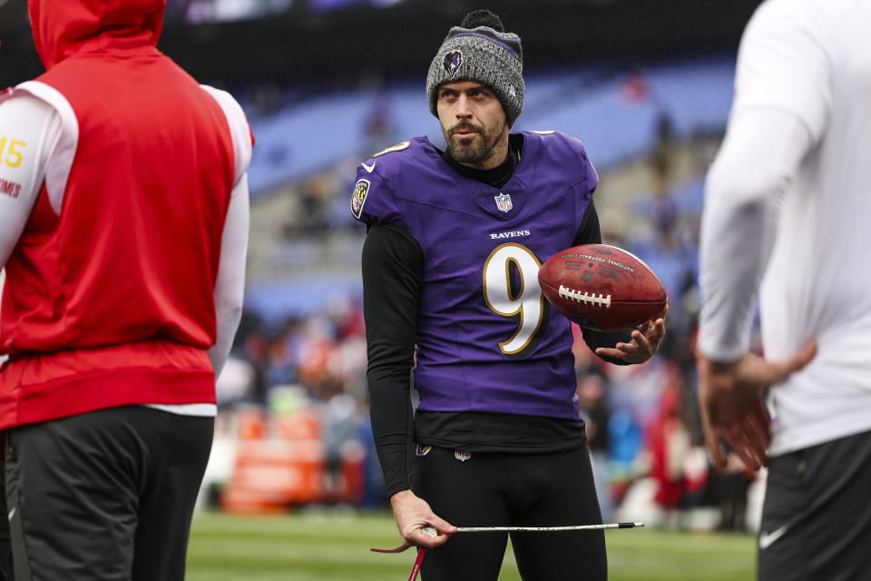 Close-up of Justin on the football field in uniform