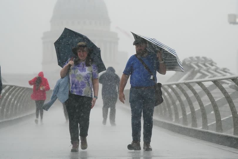 People walking with umbrella