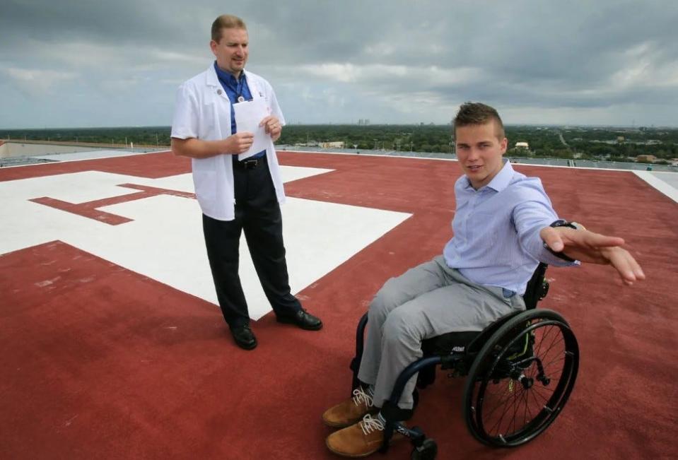 In 2015, future Congressman Madison Cawthorn visited with staff, including then-trauma center director Kevin Captain, at Halifax Health Medical Center in Daytona Beach, where he had been airlifted a year earlier.