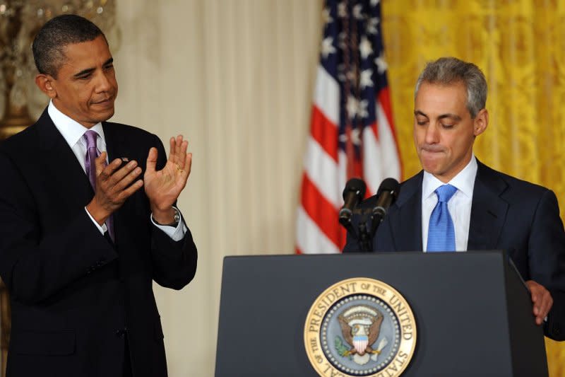 U.S. President Barack Obama applauds Rahm Emanuel, who is holding back tears, after Obama announced Emanuel will be replaced by Pete Rouse as White House chief of staff in the East Room of the White House in Washington on October 1, 2010. File Photo by Roger L. Wollenberg/UPI