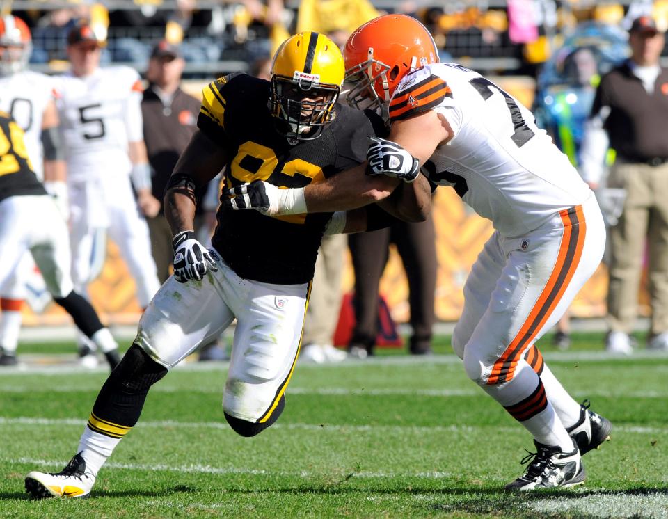 Pittsburgh Steelers linebacker James Harrison (92) pass rushes around Cleveland Browns offensive lineman Joe Thomas(73) during a game Oct. 17, 2010, in Pittsburgh.