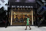 <p><b>Burberry</b></p>The British luxury fashion house is distinctively known for its tartan pattern. Apart from its popular trench coat the company is known for its accessories, bags, shoes, watches and fragrance among other products.<p>Brand value: $4,342 million</p><p>(Photo: Reuters Pictures)</p>