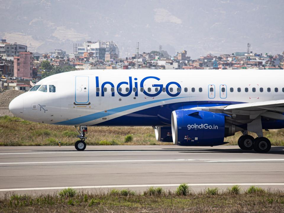 An IndiGo airlines plane on the runway at Kathmandu Tribhuvan International Airport.