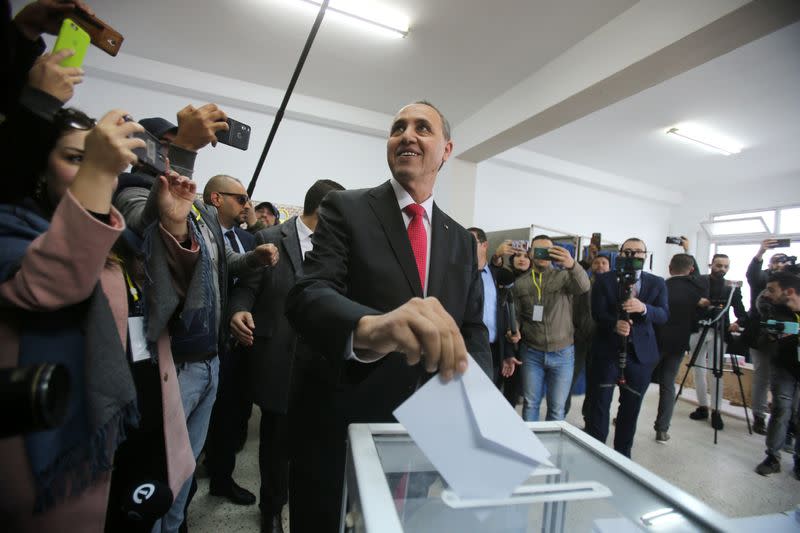 Algeria's presidential candidate Azzedine Mihoubi casts his ballot during the presidential election in Algiers