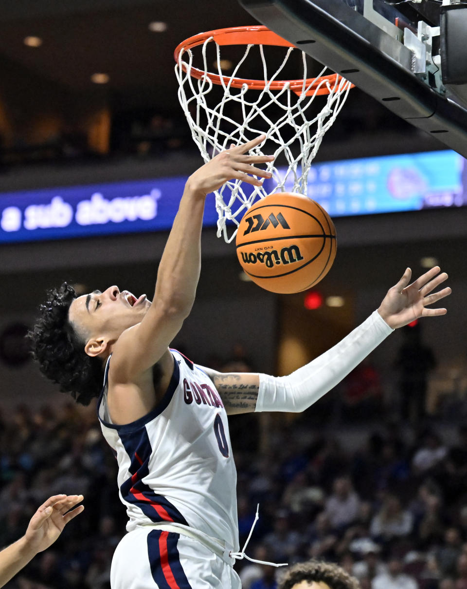 Gonzaga guard Julian Strawther is fouled as he shoots against San Francisco during the second half of an NCAA college basketball game in the semifinals of the West Coast Conference men's tournament Monday, March 6, 2023, in Las Vegas. (AP Photo/David Becker)