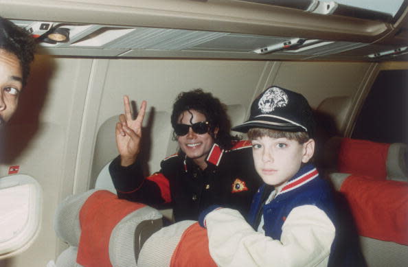 Michael Jackson with 10-year-old James Safechuck on the tour plane in 1988. Photo: Getty Images