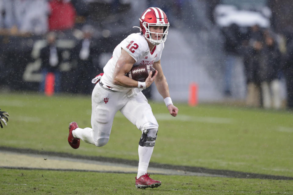 Indiana quarterback Peyton Ramsey (12) runs against Purdue during the first half of an NCAA college football game in West Lafayette, Ind., Saturday, Nov. 30, 2019. (AP Photo/Michael Conroy)