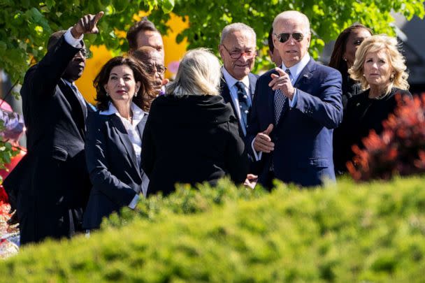 PHOTO: President Joe Biden and First Lady Dr. Jill Biden visit a memorial at Tops Friendly Market, May 17, 2022 in Buffalo, NY. (Kent Nishimura/Los Angeles Times via Getty Images)