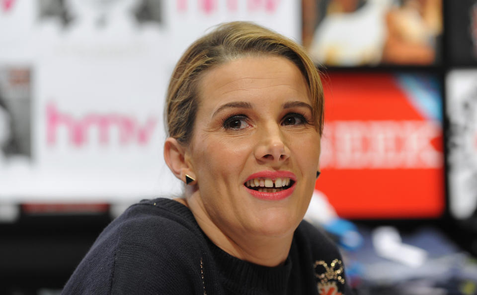 X Factor winner Sam Bailey signs copies of her new single at an HMV Store in Leicester.   (Photo by Joe Giddens/PA Images via Getty Images)