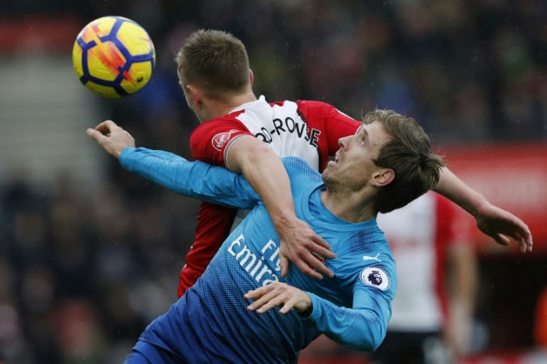 Southampton's James Ward-Prowse (L) goes head to head with Arsenal's Nacho Monreal at St Mary's Stadium