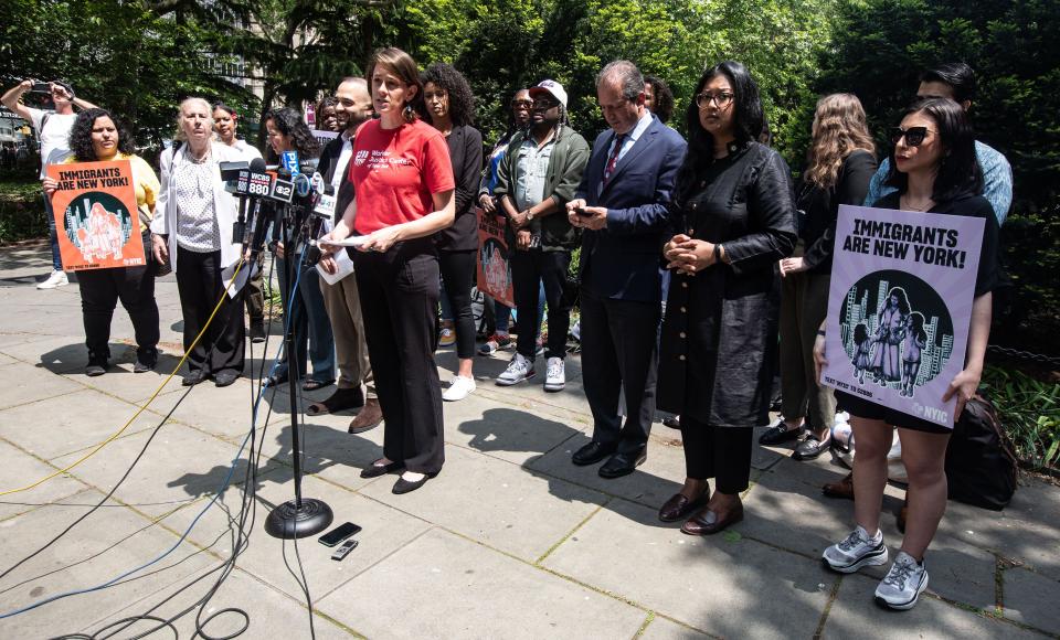 Emma Kreyche of the Workers Justice Center of New York based in Kingston, speaks during a press conference near City Hall in Manhattan May 11, 2023. New York City elected officials, along with immigrant advocates from the lower Hudson Valley spoke about the need to coordinate efforts to aid asylum seekers and migrants as Title 42 came to end on Thursday. 