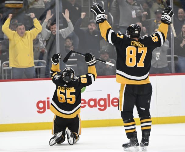 NHL: Pittsburgh Penguins defeat Detroit Red Wings in overtime