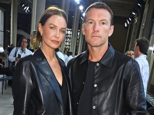 <p>Dave Benett/Getty</p> Lara Worthington and Sam Worthington attend the Hermes SS24 Men's Show