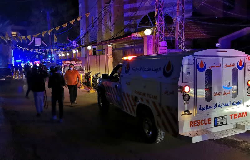 A rescue team's vehicle is seen at the Palestinian camp where an explosion took place in Tyre