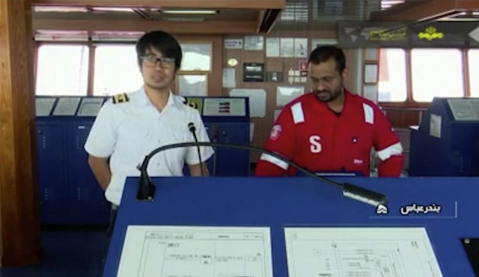 In this photo released by state-run IRIB News Agency, which aired on Monday, July 22, 2019, shows members of the crew of the British-flagged tanker Stena Impero that was seized by Tehran in the Strait of Hormuz on Friday. The Associated Press cannot independently verify the condition of the crew members, but in the video they looked to be in good health and it didn't appear as though they were being filmed under duress. (IRIB News Agency via AP)