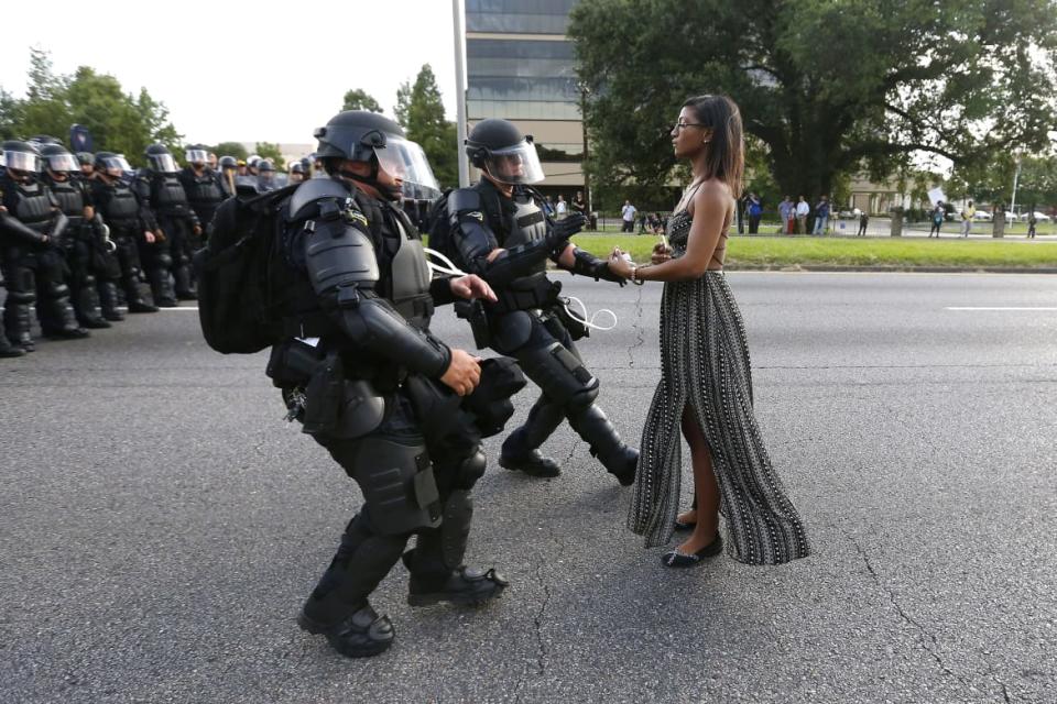 <div class="inline-image__caption"><p>A demonstrator protesting the shooting death of Alton Sterling is detained by law enforcement near the headquarters of the Baton Rouge Police Department in Baton Rouge, Louisiana, U.S. July 9, 2016. </p></div> <div class="inline-image__credit">Jonathan Bachman/Reuters</div>