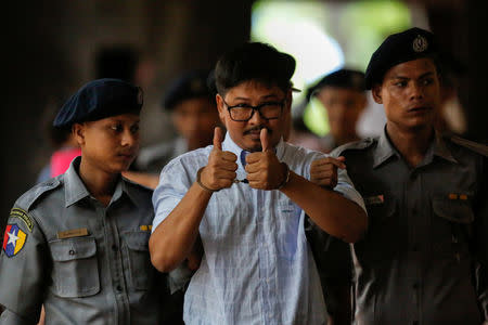 Detained Reuters journalist Wa Lone arrives for the court hearing in Yangon, Myanmar June 18, 2018. REUTERS/Ann Wang