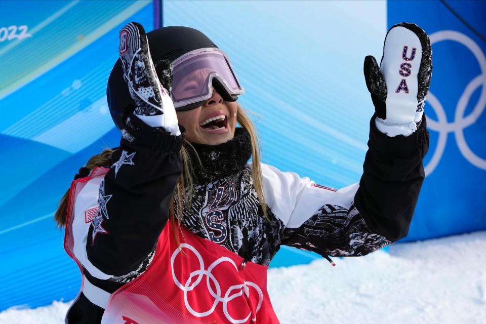 Chloe Kim cries tears of joy after winning gold at the 2022 Beijing Olympics.