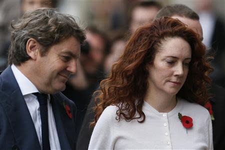 Former News International chief executive Rebekah Brooks and her husband Charlie arrive at the Old Bailey courthouse in London November 1, 2013. REUTERS/Stefan Wermuth