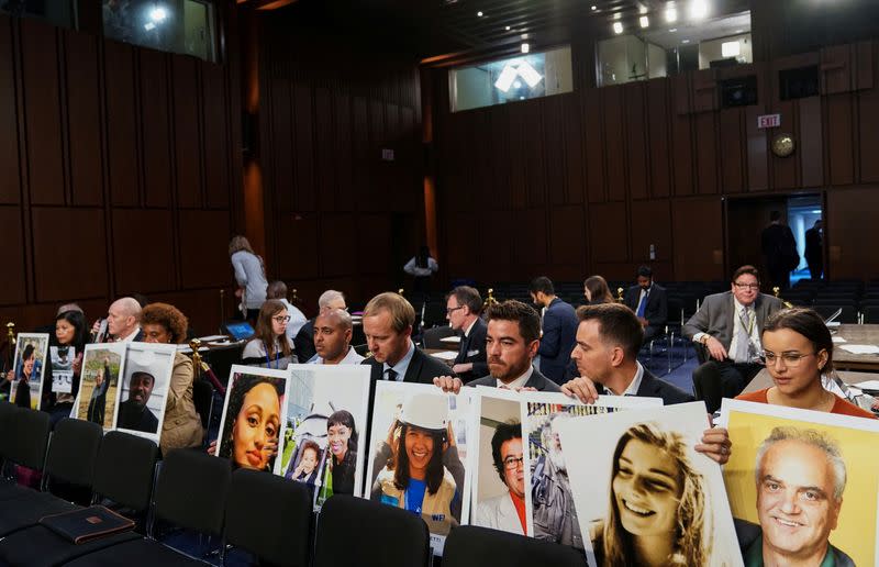 FILE PHOTO: Family members attend as Boeing's Muilenburg testifies before Senate Commerce, Science and Transportation hearing on grounded 737 MAX on Capitol Hill in Washington