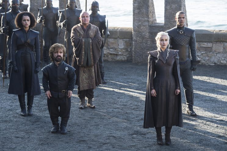 Nathalie Emmanuel as Missandei, Peter Dinklage as Tyrion Lannister, Conleth Hill as Varys, Emilia Clarke as Daenerys Targaryen, and Jacob Anderson as Grey Worm in HBO&#39;s Game of Thrones. (Photo: HBO)
