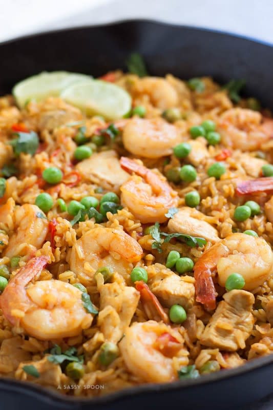 <p>A Sassy Spoon</p><p>A simple-to-make paella using brown rice, chicken, shrimp, turmeric, smoked paprika and fresh lime juice. Perfect for a special occasion or weekly meal prep!</p><p><strong>Get the recipe: <a href="https://asassyspoon.com/healthy-chicken-shrimp-paella/" rel="nofollow noopener" target="_blank" data-ylk="slk:Healthy Chicken Shrimp Paella;elm:context_link;itc:0;sec:content-canvas" class="link ">Healthy Chicken Shrimp Paella</a></strong></p><p><strong>Related: <a href="https://www.yahoo.com/lifestyle/40-authentic-soul-food-recipes-003133569.html" data-ylk="slk:40 Best Soul Food Recipes;elm:context_link;itc:0;sec:content-canvas;outcm:mb_qualified_link;_E:mb_qualified_link;ct:story;" class="link  yahoo-link">40 Best Soul Food Recipes</a></strong></p>